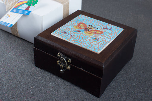 Handmade wooden boxes with ceramic cover (to support the treatment of cancer patients) exxab.com
